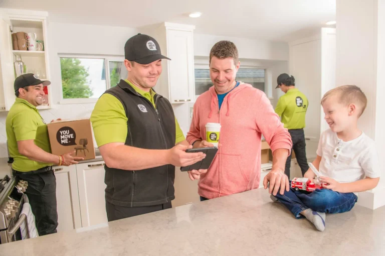 You Move Me mover reviewing costs with home owner